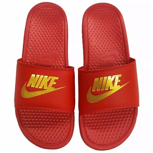 red and gold nike slippers
